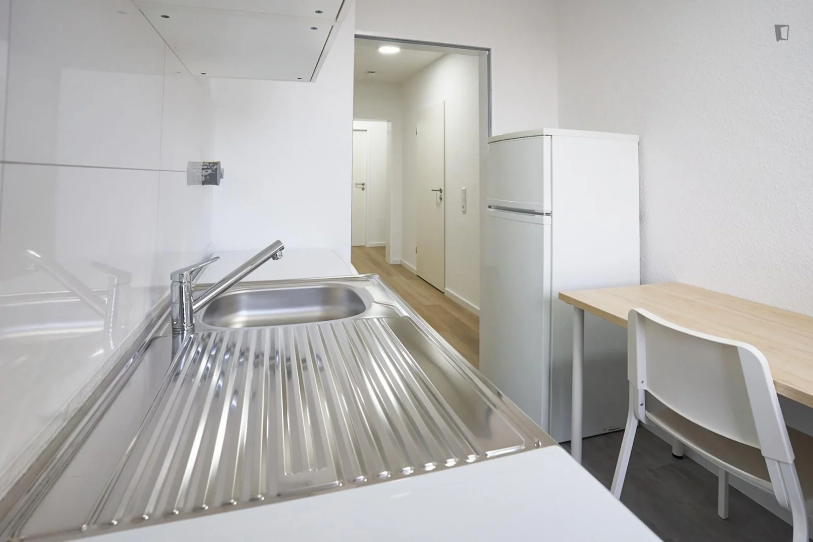 Student room in  with study area and shared facilities