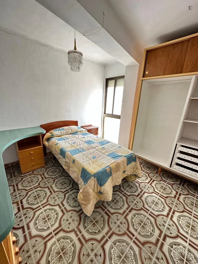 Student room in  with study area and shared facilities