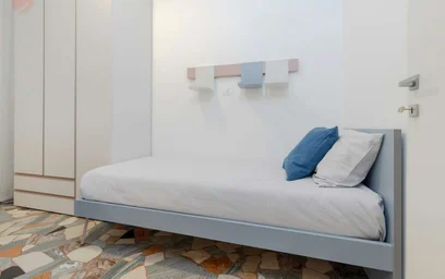 {area} de çift kişilik yataklı kiralık oda