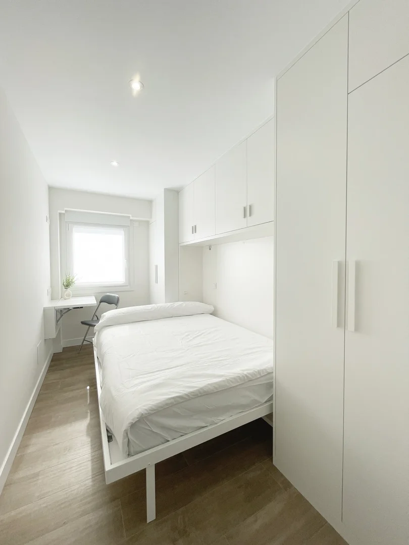 Affordable room for students with ample lighting in 