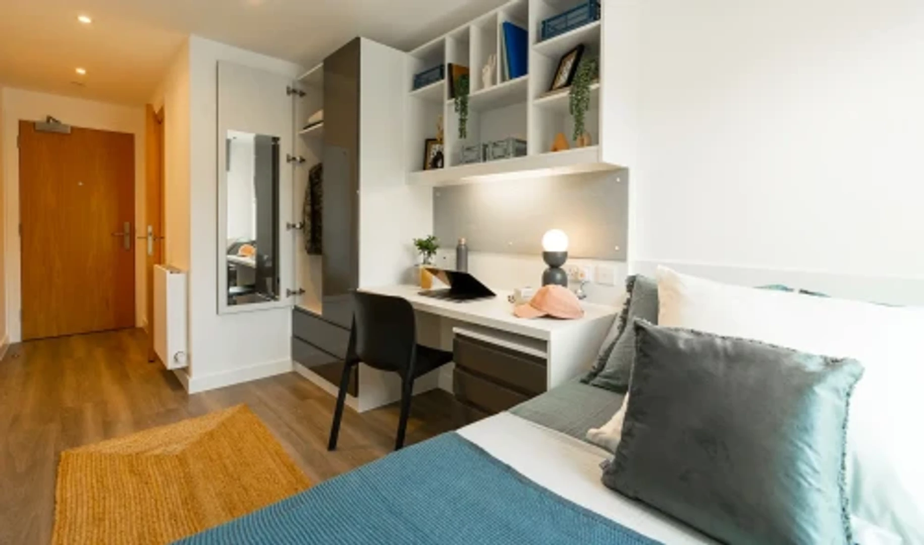 Student room in  with study area and shared facilities