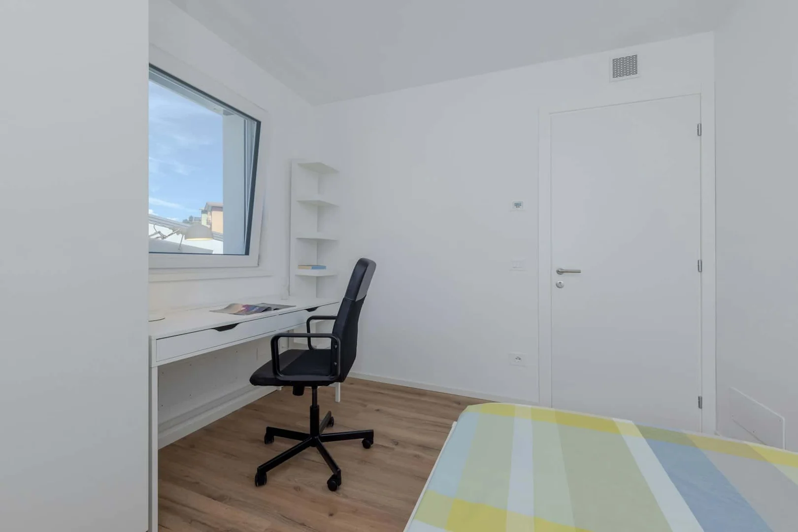 Affordable room for students with ample lighting in 