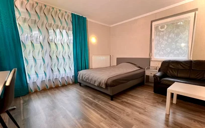 {area} de ortak bir dairede kiralık oda