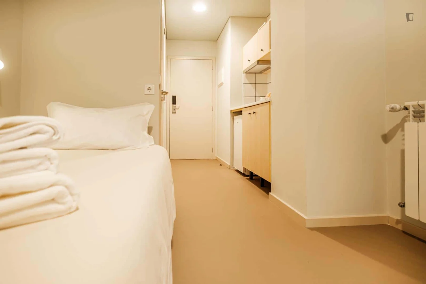 Student room in  with study area and shared facilities