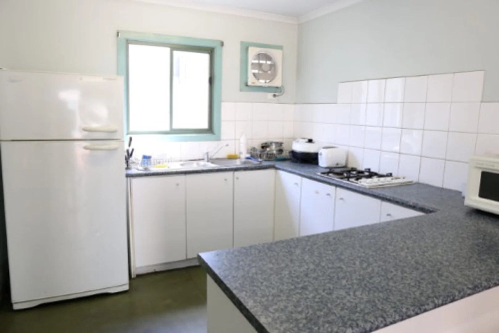 Student room in  with study area and shared facilities