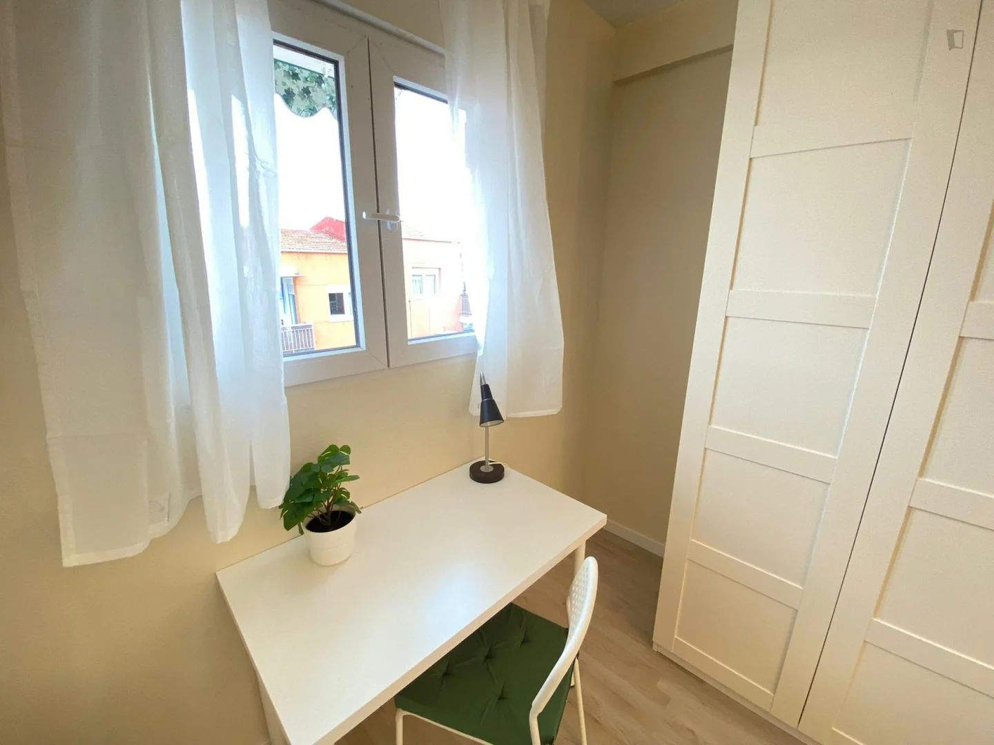 Student room in  with study area and shared facilities