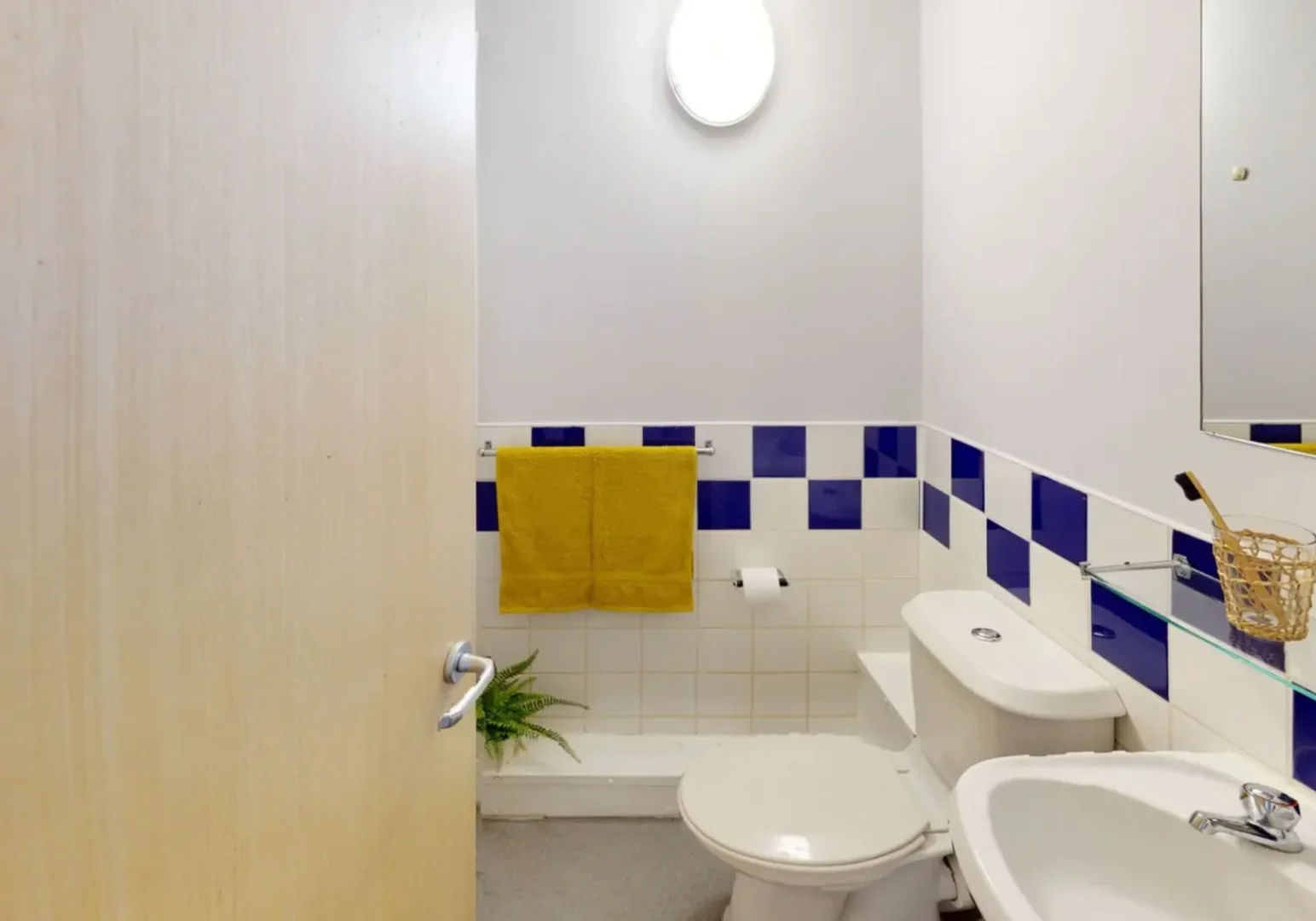 Student room in with study area and shared facilities