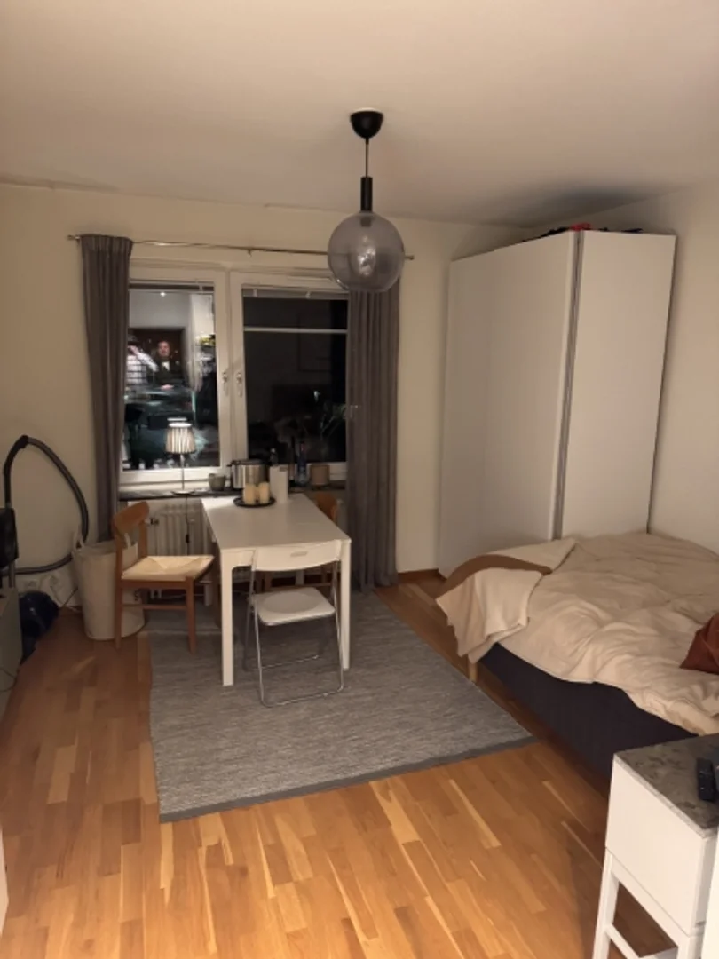 Student room in  with study area and shared facilities