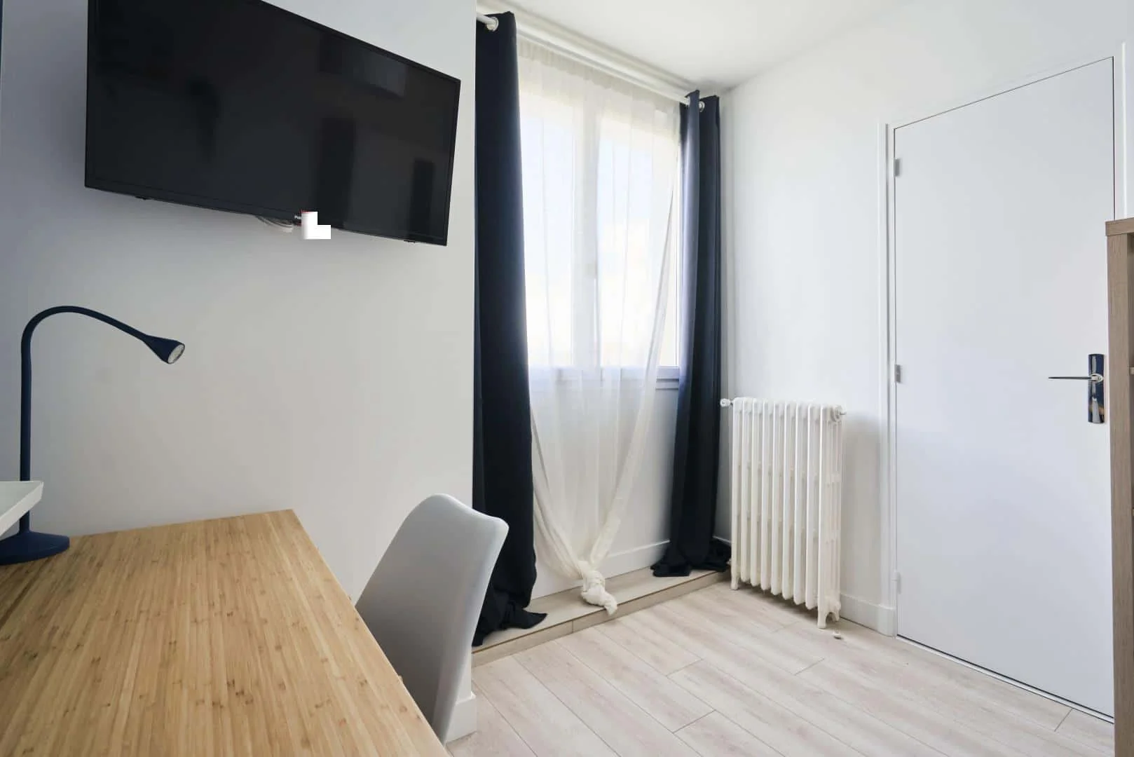 Student room in  with study area and shared facilities