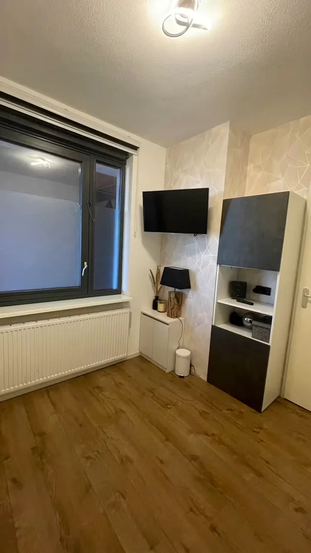 Student room in  with study area and shared facilities