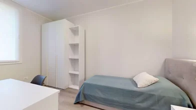 Quarto iluminado em {area}