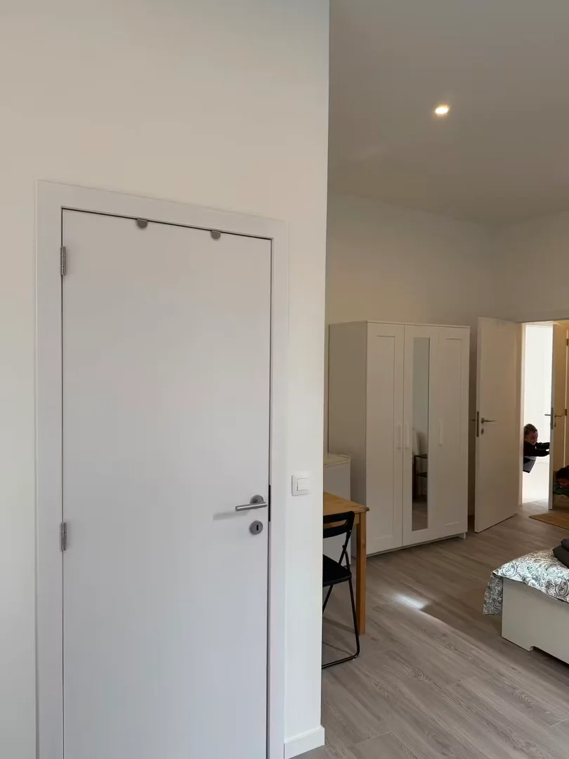 Student room in  with study area and shared facilities