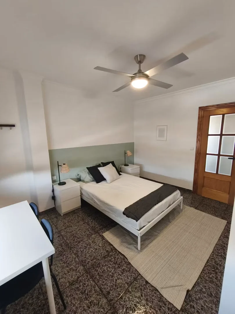 Student room in  with study area and shared facilities