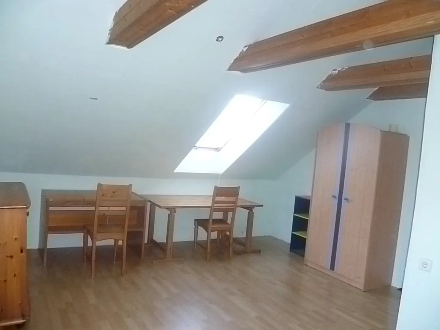 Student room in with study area and shared facilities
