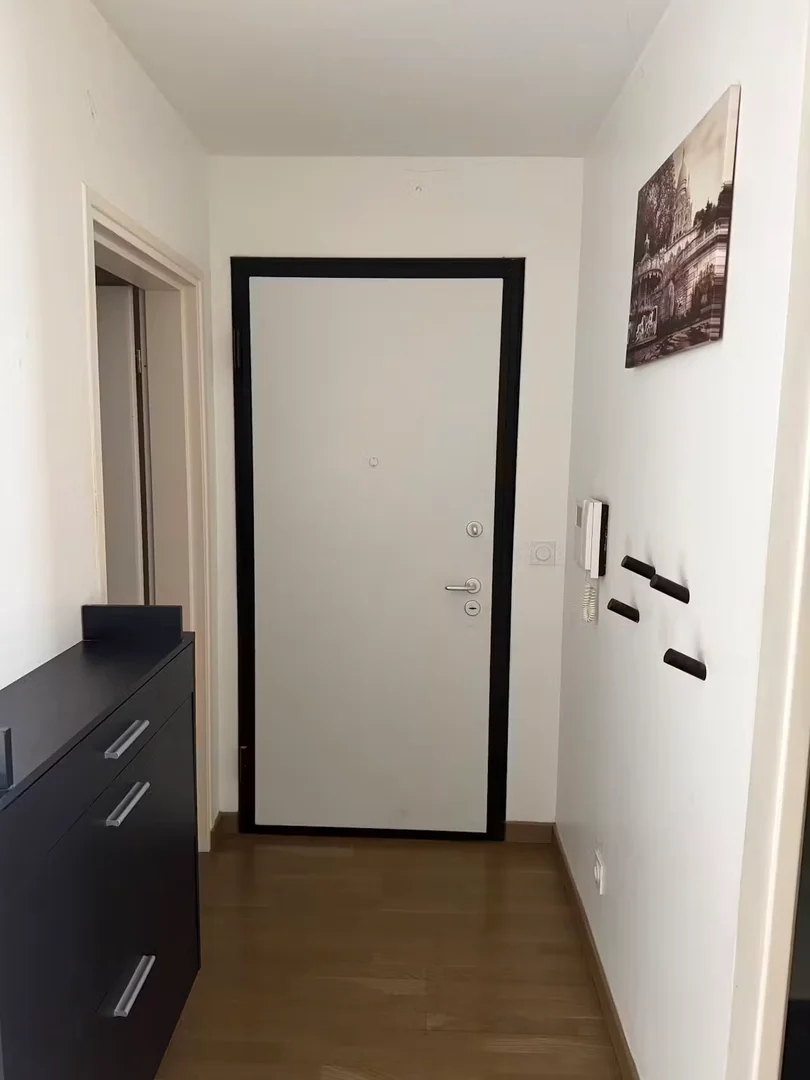 Student room in with study area and shared facilities