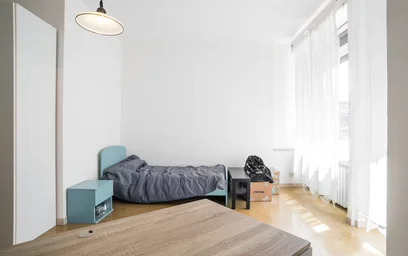 {area} de çift kişilik yataklı kiralık oda