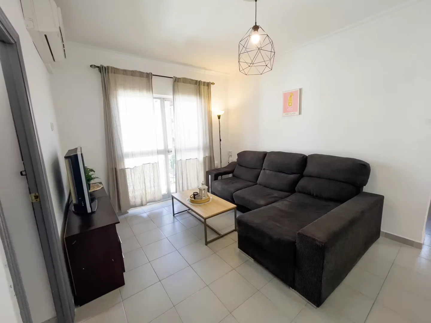 Affordable room for students with ample lighting in 