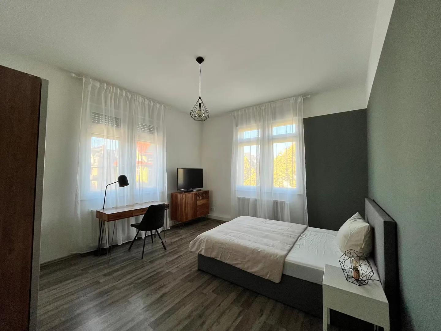 Student room in  with study area and shared facilities