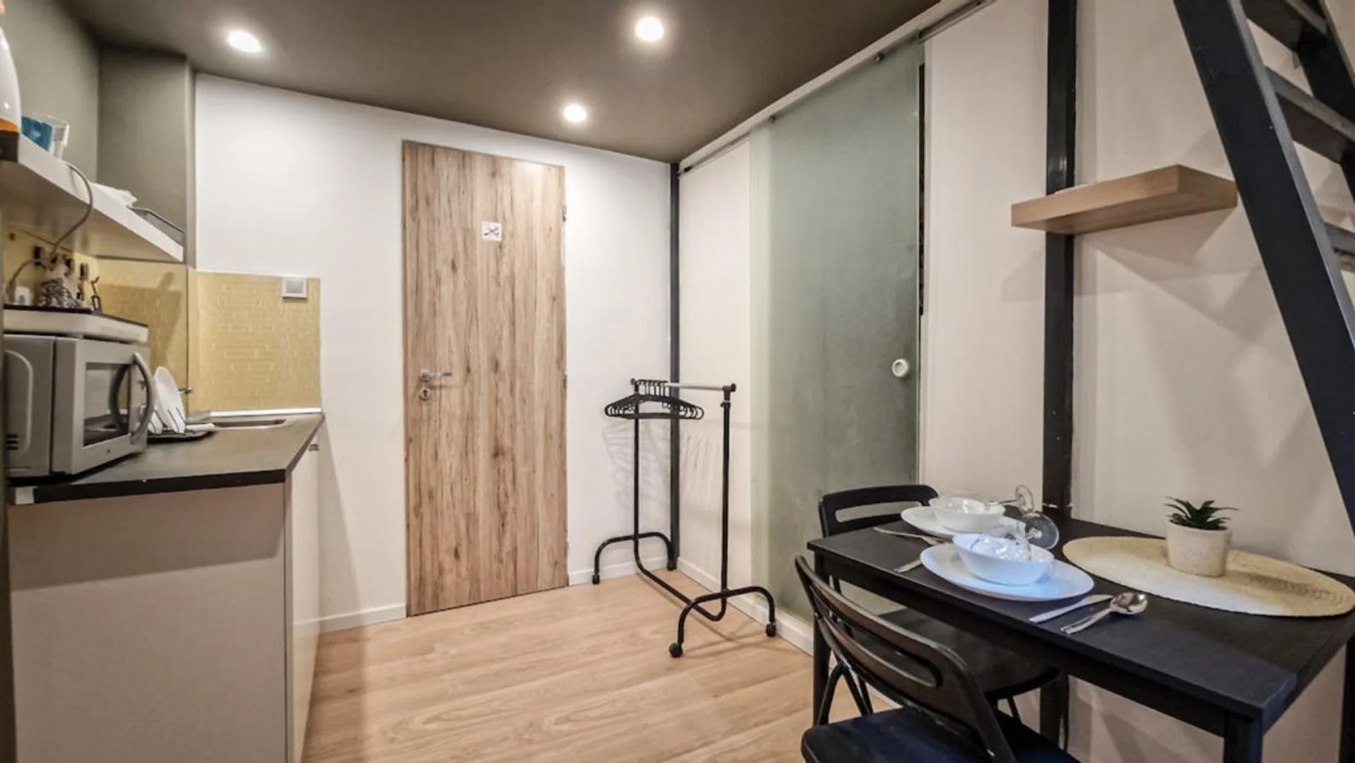 Affordable studio apartment with essential features in 