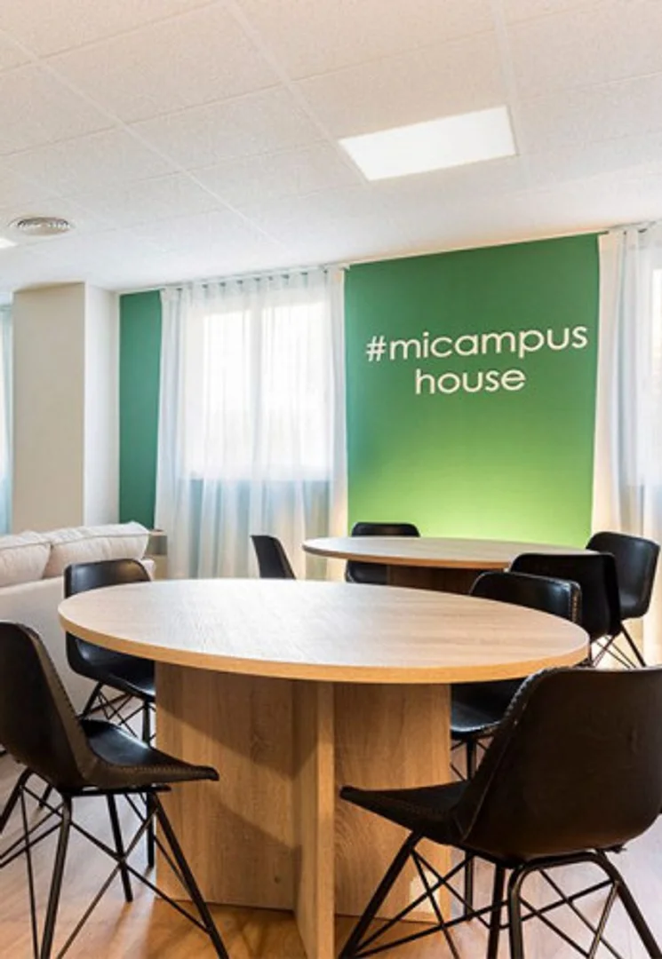 Student room in  with study area and shared facilities