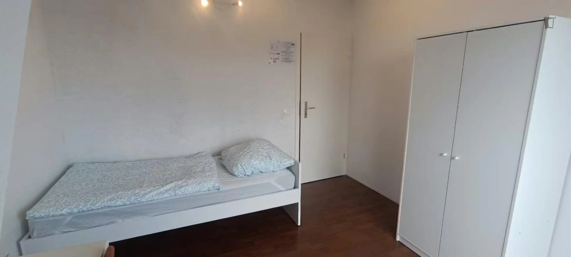 Student room in  with study area and shared facilities