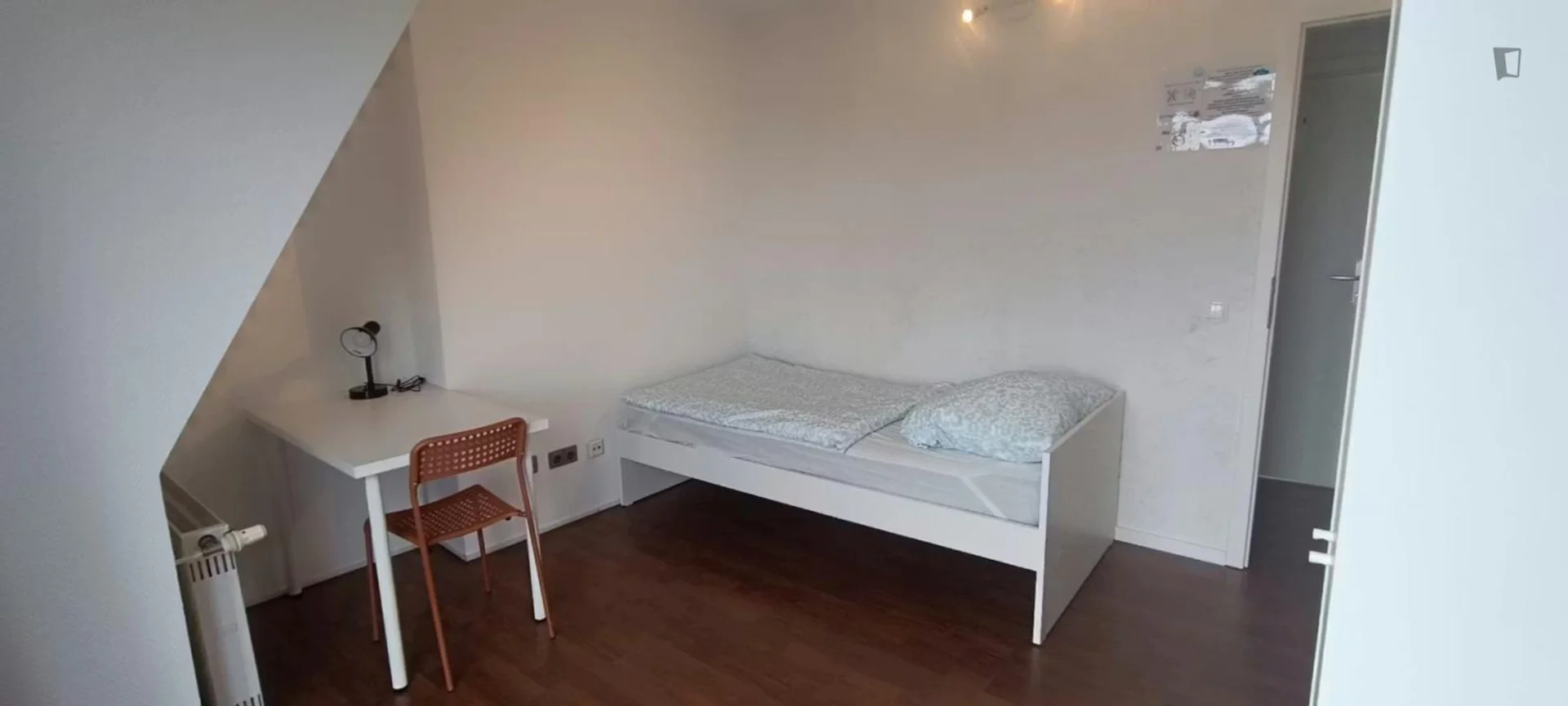 Student room in  with study area and shared facilities