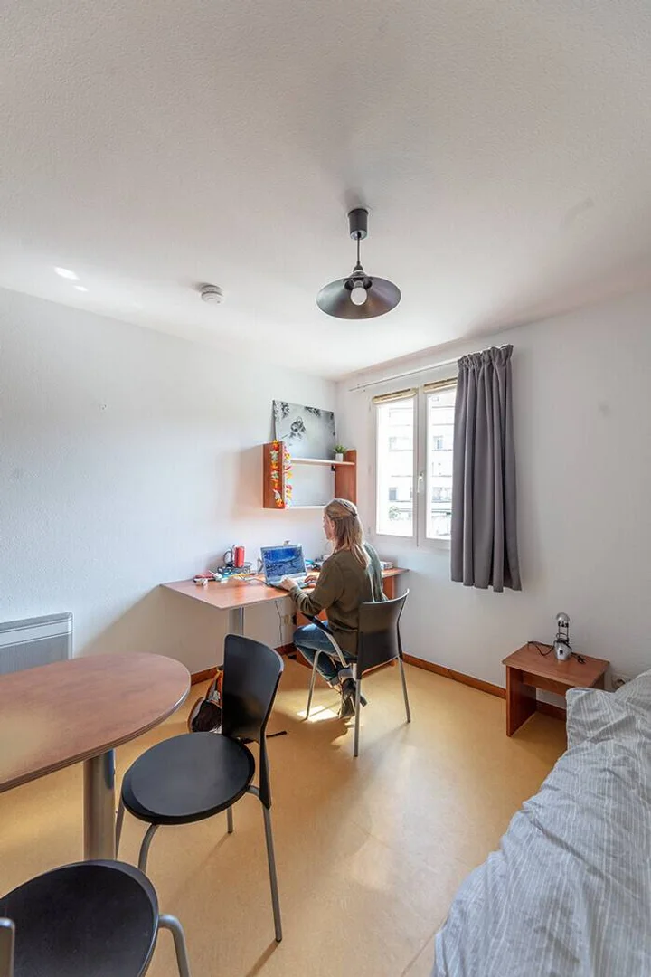 Student room in  with study area and shared facilities