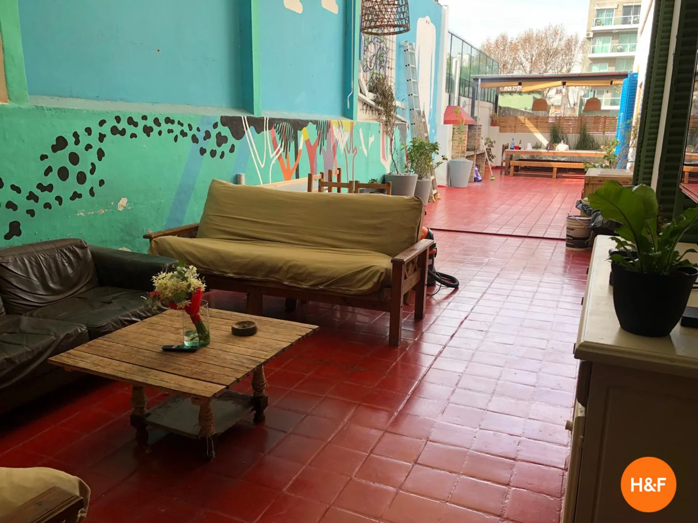 Student room in with study area and shared facilities