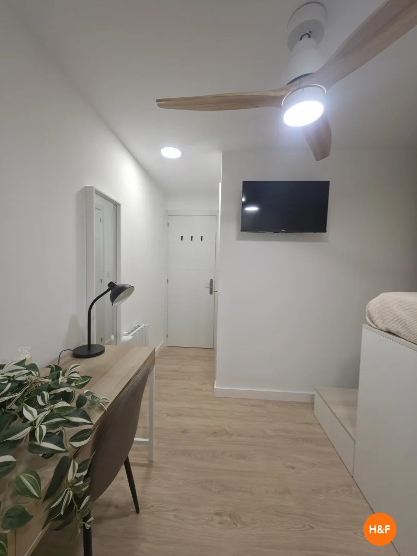 Student room in  with study area and shared facilities
