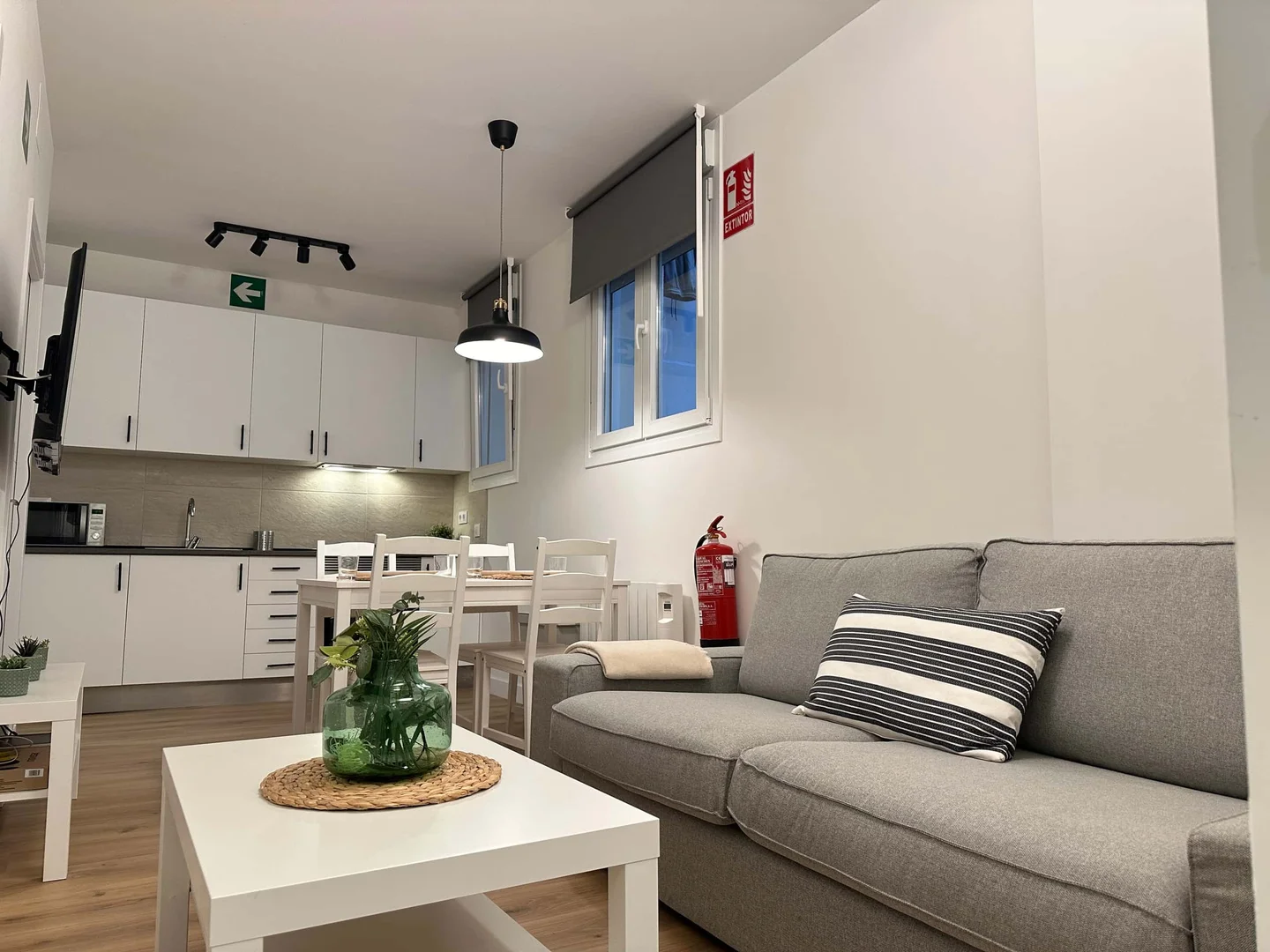 Student room in with study area and shared facilities